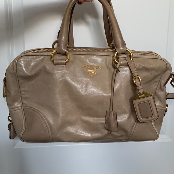 Prada Handbags - Prada Beige Leather Satchel with Gold Hardware